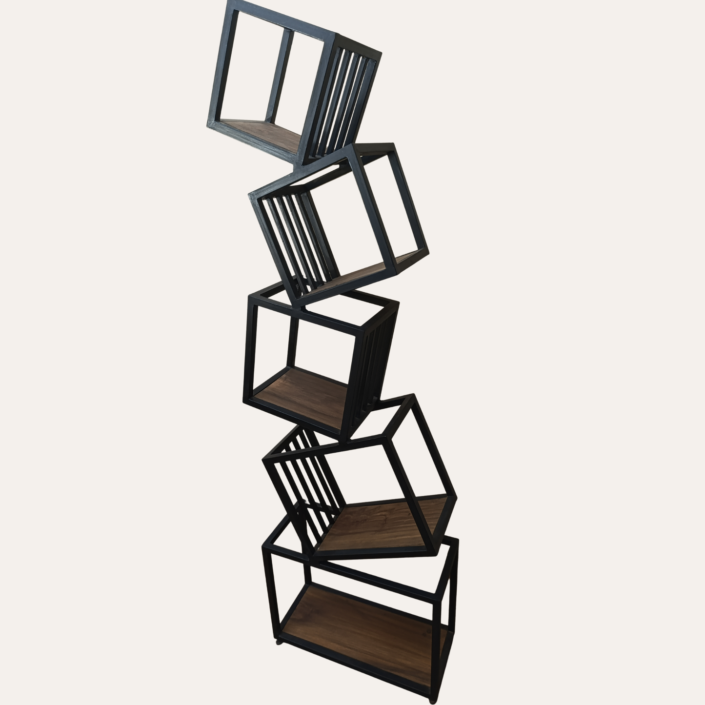 “Contemporary 5-tier geometric metal bookshelf styled in a modern living room – durable black shelving unit by Adaptivo Furniture.”