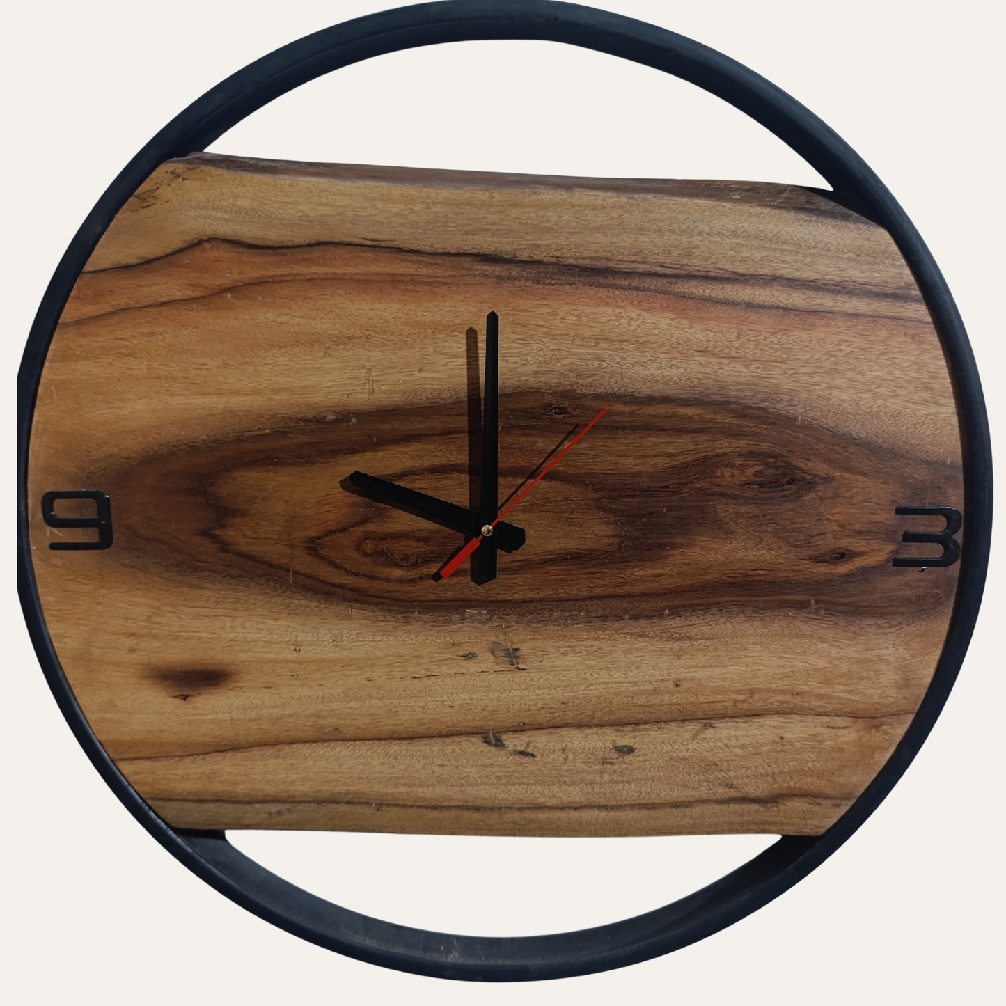 Close-up of Sheesham wood texture and clock hands from Adaptivo Furniture’s new round wall clock design
