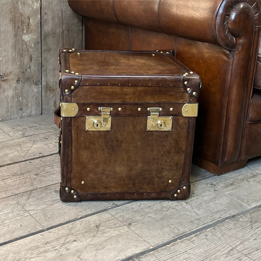 Handmade leather luxury side table trunk compact storage accent table by Adaptivo Furniture