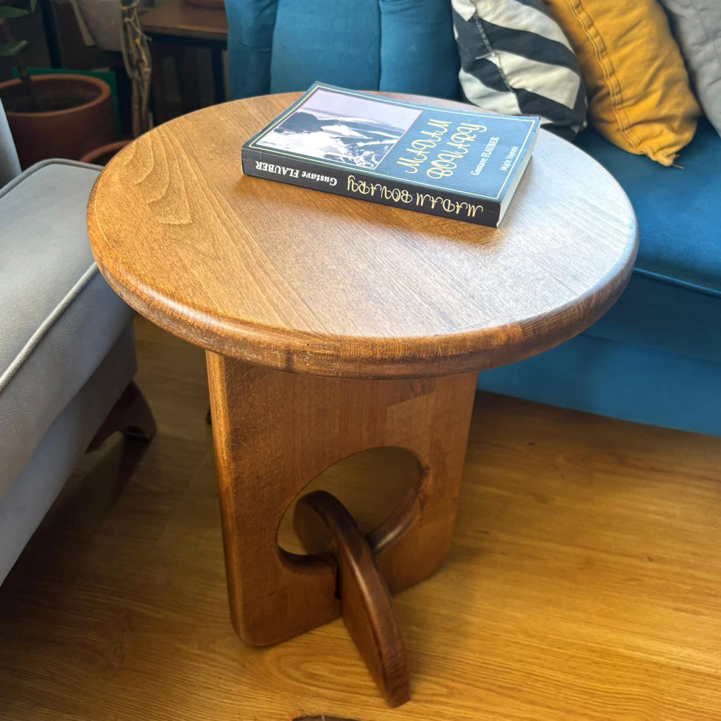 Modern sculptural wooden side table for living room