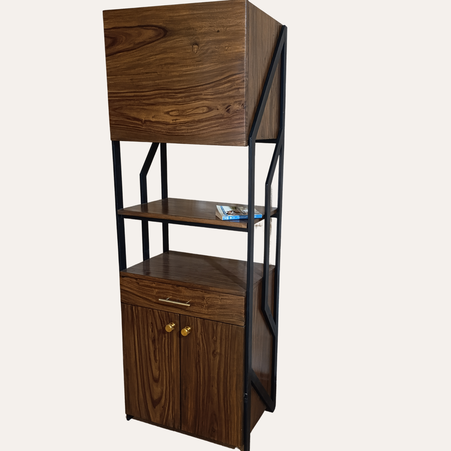 Sheesham wood and metal bookshelf styled with books and décor accessories in a modern living room setup.