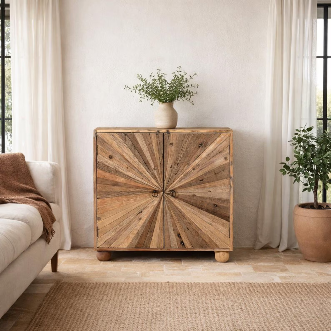 Wooden cabinet with starburst design in a living room setting