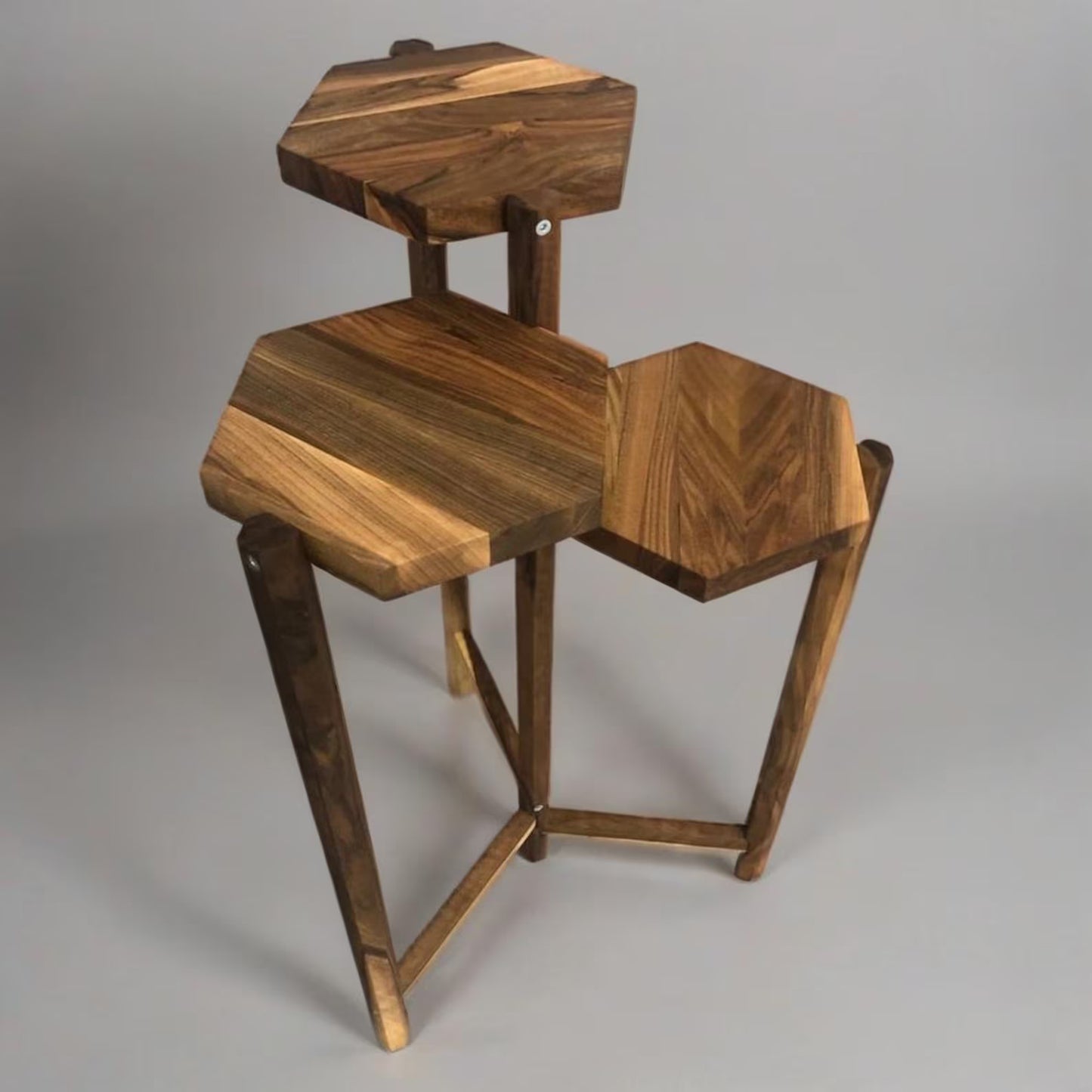 Wooden stool with geometric design on a gray background – Rustic Design Adaptivo Furniture
