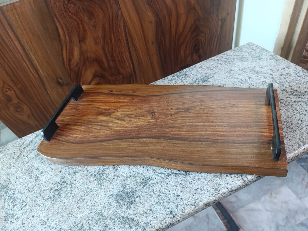 Side view of handcrafted large Sheesham wood serving tray