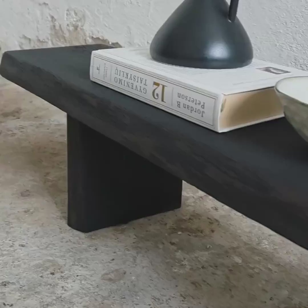 Long narrow burnt Sheesham wood console table for modern hallway and living room interiors.